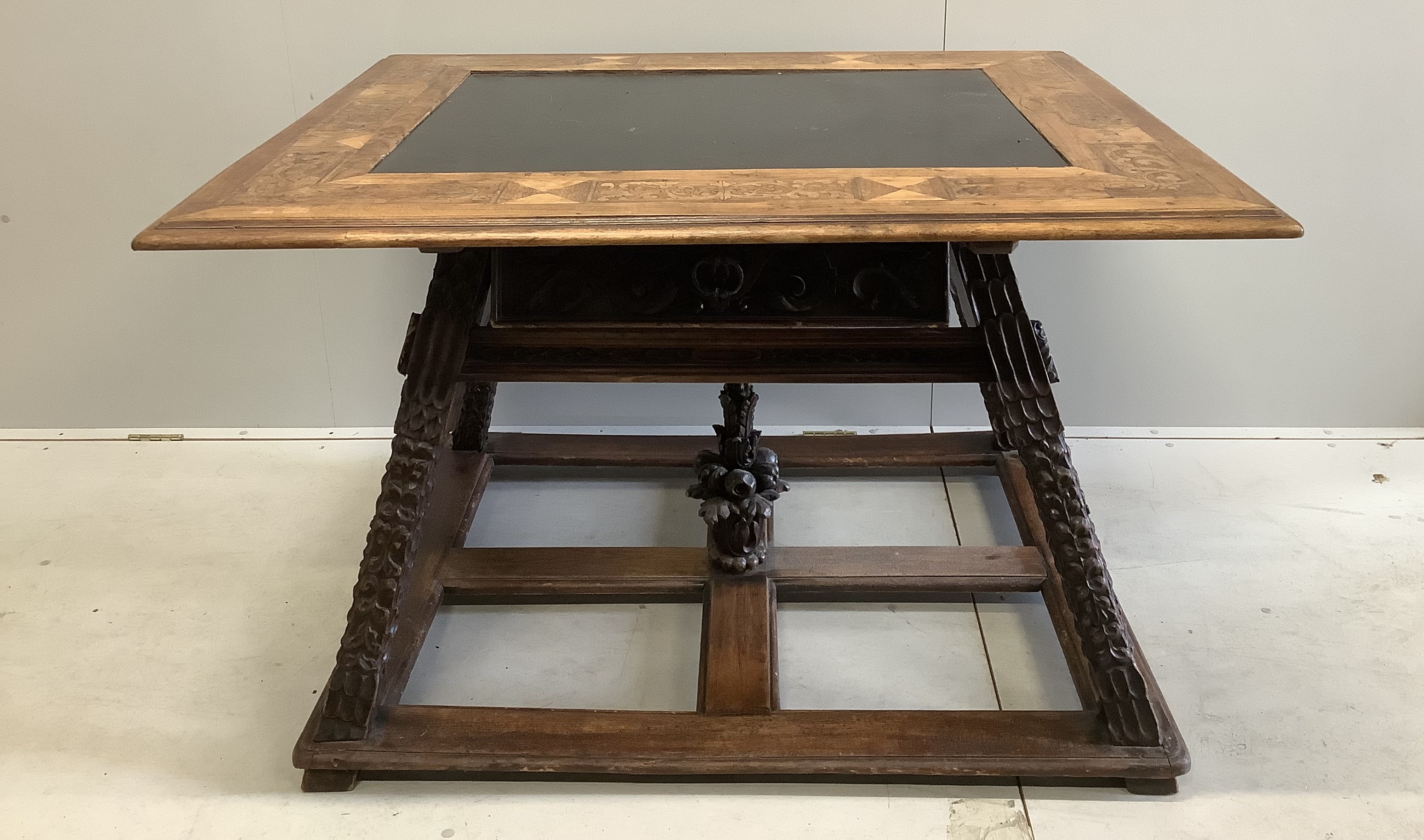 An Italian marquetry inlaid rectangular walnut slate top centre table, width 123cm, depth 104cm, height 79cm